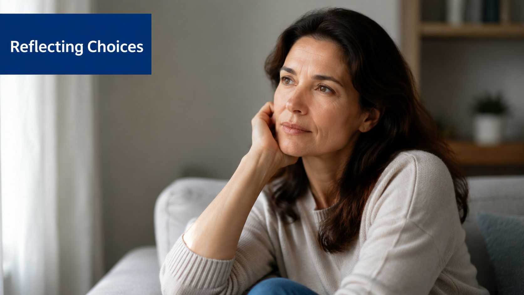 A pensive middle-aged woman sitting on a sofa while contemplating her life choices and future.